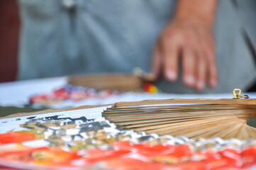 Obraz premium Calligraphy Artist decorating Chinese Fan