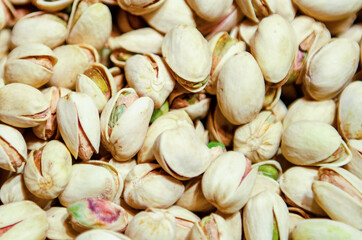 Pistachios background close-up. Top view. Healthy food background