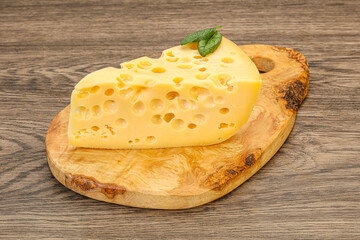 Maasdam cheese - yellow triangle with holes