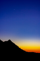 desert mountain sunset and moon