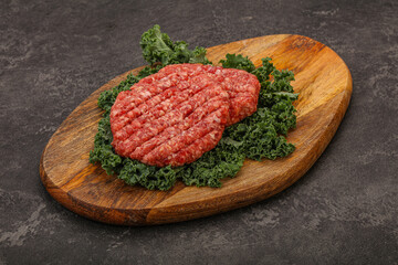 Raw beef burger cutlet for cooking