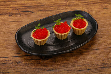 Apetizer - tartlet with red caviar