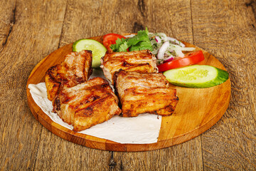 Grilled pork shashlick served vegetables
