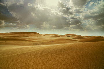 sand dunes and clouds