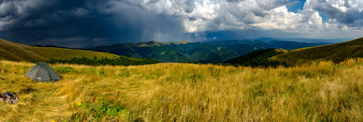 Thunderstorm is approaching in the Сarpathians. Panorama