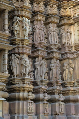 Fototapeta na wymiar Detail of the Vamana Temple in Khajuraho, Madhya Pradesh, India. Forms part of the Khajuraho Group of Monuments, a UNESCO World Heritage Site.