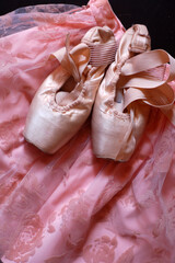 Pointe shoes on a ballet tutu