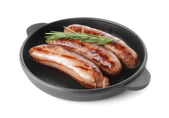 Frying pan with delicious grilled sausages on white background