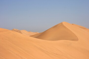 Fototapeta na wymiar Sand Dunes and patterns in nature in the desert, Walvis Bay, Namibia.