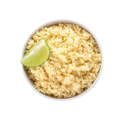 Bowl with tasty couscous and lime on white background
