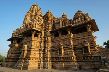 Foto op Canvas The Lakshmana Temple in Khajuraho, Madhya Pradesh, India. Forms part of the Khajuraho Group of Monuments, a UNESCO World Heritage Site. © Oscar Espinosa