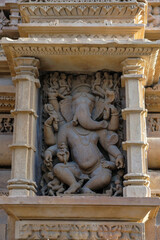 Detail of the Lakshmana Temple in Khajuraho, Madhya Pradesh, India. Forms part of the Khajuraho Group of Monuments, a UNESCO World Heritage Site.