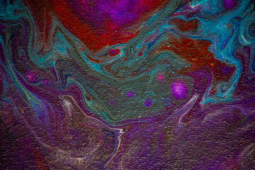 Texture in the style of fluid art. Abstract background with swirling paint effect. Liquid acrylic paint background. lilac, blue, turquoise and red colors.