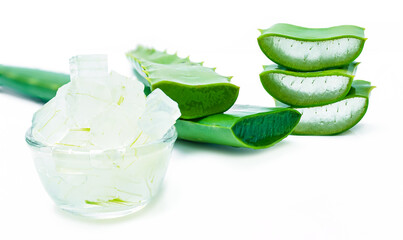 fresh aloe vera leaves and Aloe pulp in a glass jar on white background.                  