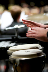 concert band rehearsal and performance on stage. 
