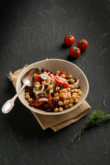 chickpeas salad witn red beans tomatoe onions and thymus