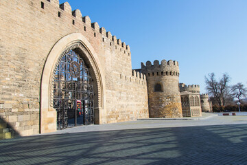 Fototapeta na wymiar Fortress of the Old City Baku, entrance gate. Historical core of Azerbaijan Baku
