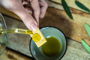 Salty snack of chickpea croutons with olive oil