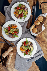 Grilled vegetables on a white plates. restaurant
