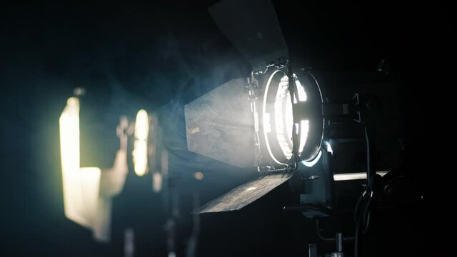 Professional lighting equipment on the movie set with smoke in the air
