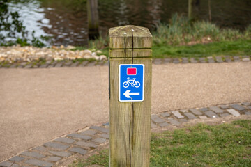 National cycle route sign on the bank of the River Wensum in the city of Norwich