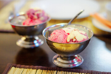 Fruit ice cream in metal bowls