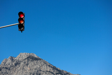 traffic light against the blue sky