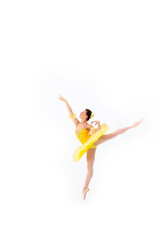 Young modern ballet dancer in yellow dress isolated on white background