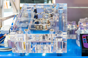 Acrylic or clear plastic transparent mold show detail inside such as gate system runner gravity...