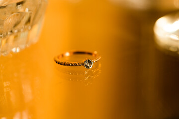 Wedding ring. Golden ring. Background. Sensual. 