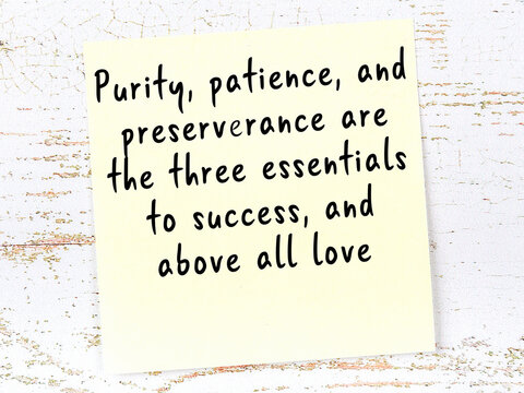 Yellow sticky note with handwritten motivational quote