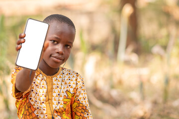 african kid shows the blank screen of a mobile phone