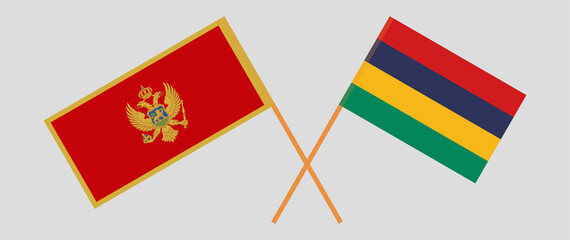 Crossed flags of Montenegro and Mauritius. Official colors. Correct proportion