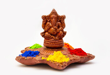 Lord Ganesha with  colorful traditional happy holi color powder