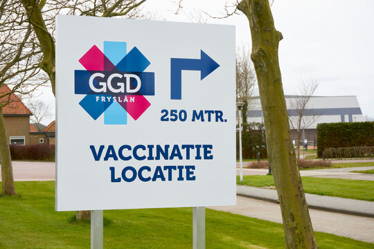 Covid-19 coronavirus vaccination centre sign on roadside in Friesland, The Netherlands. The vaccinations are provided by the GGD.     