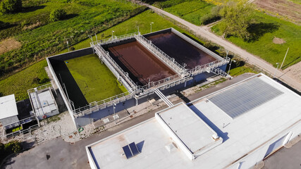 Aerial view of wastewater treatment plant, filtration of dirty or sewage water in Esposende,...