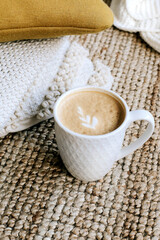 Small cup of coffee on a textile background