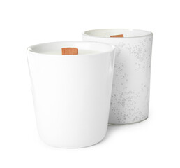 Beautiful candles with wooden wicks on white background