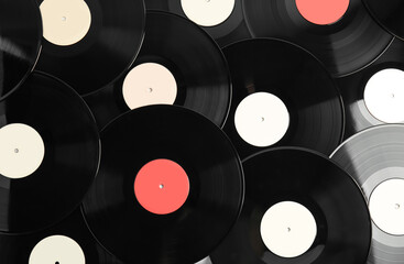 Many different vintage vinyl records as background, top view