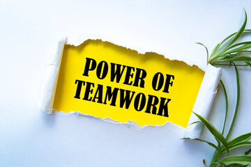 Text sign showing POWER OF TEAMWORK