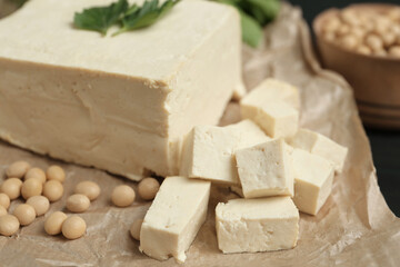 Fototapeta na wymiar Delicious tofu and soy on table, closeup