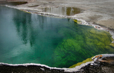An abstract minimal detail view of the colorful deep waters of the Abyss Pool at West Thumb Geyser Basin in Yellowstone National Park, Wyoming, USA, 2005
