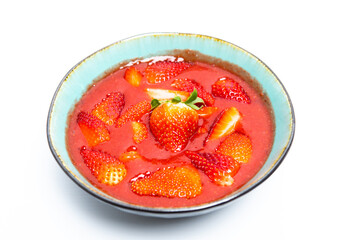 strawberry smoothie in white background. spring or summer healthy food concept. real food