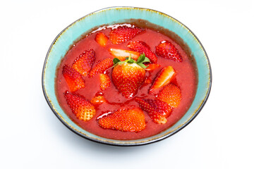 strawberry smoothie in white background. spring or summer healthy food concept. real food