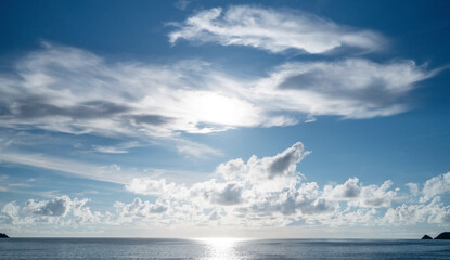 Beautiful Blue sky and white clouds flowing over sea in summer season Good weather day Tropical sea in Phuket Thailand Concept Travel background and nature environment website