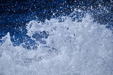 Ocean water splash isolated on white sea foam