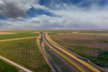 Aerial view highway interstate in desert near San Jon New Mexico - obrazy, fototapety, plakaty