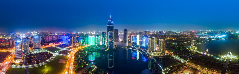 Obraz premium Aerial photography of the night view of Didang Lake Central Business District, Shaoxing, Zhejiang