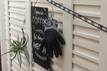 Work gloves, plants, and cafe signs