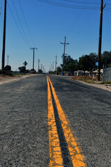 A vertical shot of a road during daytime